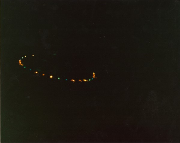 Lights from an unidentified craft photographed by a state police officer over Route I-84 near Waterbury, Connecticut, in 1987. Thousands of people witnessed UFOs in the “Hudson Valley wave” of the mid 1980’s. credit: Collection of Phil Imbrogno